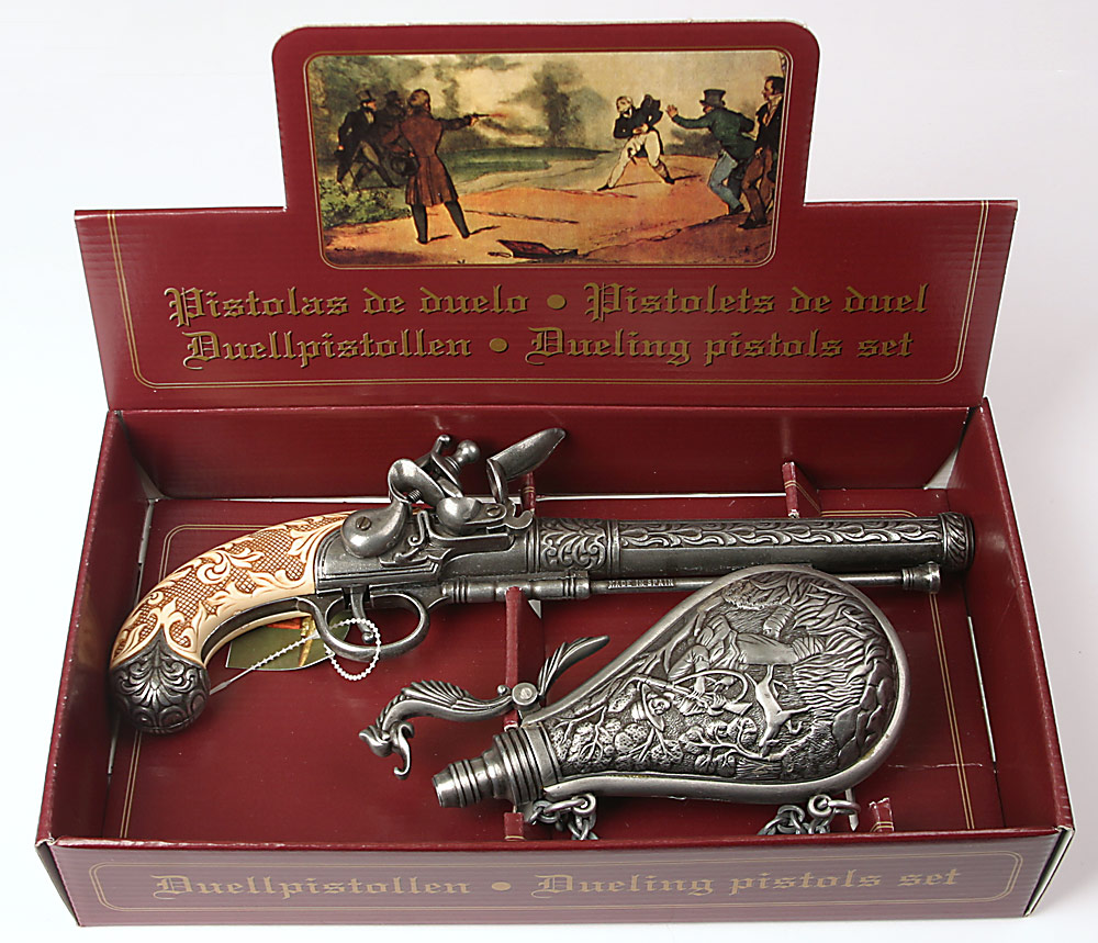 foto pistole s prachovnic� - �ed� kov